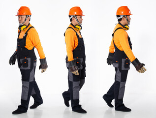 Senior Asian Man wear Orange uniform shirt hardhat and leather glove as engineer construction site