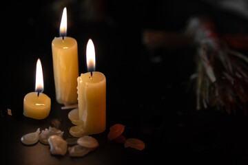 candle lights set on black background. Smoke. The concept of mysticism and ritual. The religion of dark magic and Satanism 