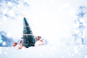 Fototapeta na wymiar Snow Christmas background. Xmas holiday tree, golden balls in new year ornament decoration on white winter snow. Merry Christmas holiday card pattern.