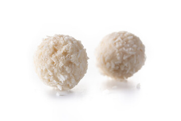 Homemade coconut balls isolated on white background