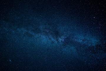 Dramatic and starry night sky on which the Milky Way and the Andromeda constellation can be seen. Space travel, galaxies, outer space, astronomy research.
