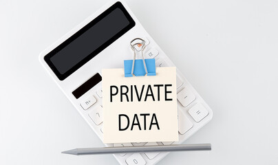 PRIVATE DATA text on the sticker on white calculator
