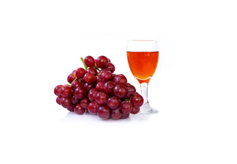 fresh grapes and grape juice in glass isolated on white background