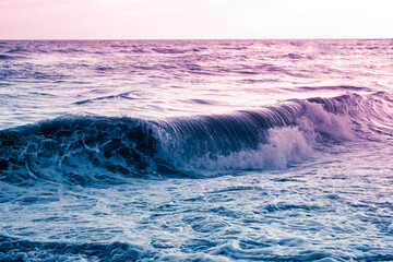 Blue purple rolling wave, a surreal seascape