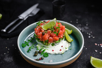 salmon and avocado tartare on a plate