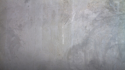 Grey plastered wall covered with rough textured plaster. Background. copy space
