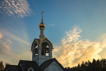 Temple bell tower at sunrise