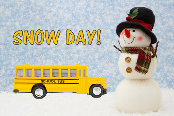 Snow Day message with happy snowman with hat, school bus, and snow