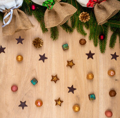 christmas background with  chocolate pralines and christmas tree  decorations
