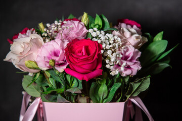 Beautiful bouquet of colorful rose flowers. Festive flowers concept.  Bouquet of fresh roses, freesias, eustoma and others.