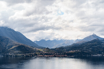 Fototapeta na wymiar Mountain peaks over the town of Menaggio. Lake Como, Italy