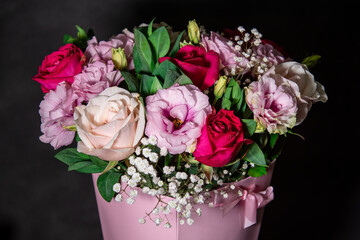 Beautiful bouquet of colorful rose flowers. Festive flowers concept.  Bouquet of fresh roses, freesias, eustoma and others.
