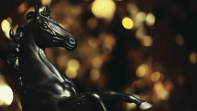 footage of black horse statue