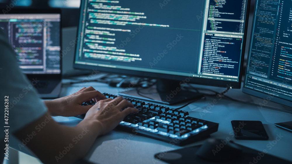 Poster Close-up Focus on Person's Hands Typing on the Desktop Computer Backlit Keyboard. Screens Show Coding Language User Interface. Software Engineer Create Innovative e-Commerce App. Program Development