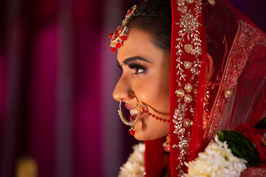 Close-up of a beautiful bride in traditional wedding clothing