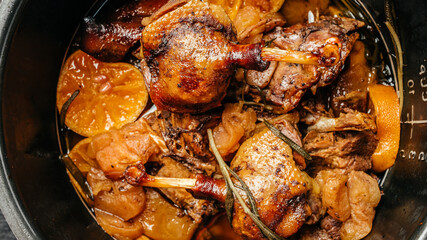 roast duck leg with rosemary and oranges, Food recipe background. Close up