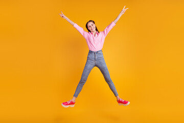 Fototapeta na wymiar Full body photo of young lovely girl have fun jump up footwear active isolated over yellow color background