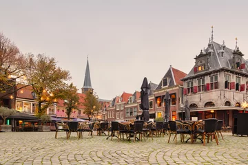 Fotobehang Uitzicht op het centrumplein Roode Steen met kerstversiering in de Nederlandse stad Hoorn, Nederland © Martin Bergsma