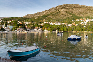 village of Srebreno in South Dalmatia with wooden rowboats moored in the marina