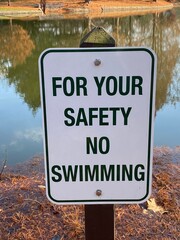 For Your Safety No Swimming Sign In Front Of Pond