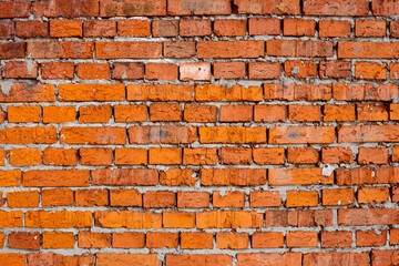 Orange  or red brick wall. Exterior building facade with copy space. Brickwork background.