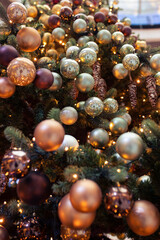 Fototapeta na wymiar Close-up of a beautifully decorated Christmas tree