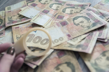 Ukrainian hryvnia close-up and copy space. A lot of Ukrainian bills, crisis, property, poverty, wealth...