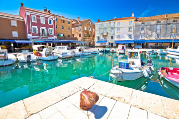 Fototapeta na wymiar Cres. Colorful harbor and waterfront in town of Cres