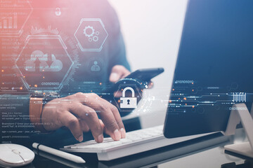 cyber security concept A businessman shows how to protect a cyber technology network from attacks by hackers on the Internet. access to privacy
