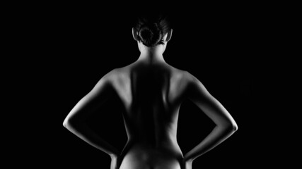 Female silhouette of spine. Naked Woman