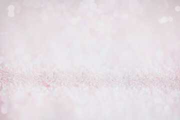 Beautiful bright blurred pink glitter bokeh background perfect for Valentines Day or Christmas. 