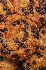 Chocolate cookie as a textured background. Wallpaper.  Brown Chocolate chip cookies top view.