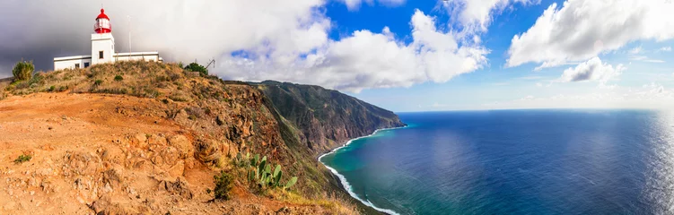 Gardinen Sea scenery of Madeira island - impressive rocky mountains in western part Ponta do Pargo. Scene with lighthouse © Freesurf