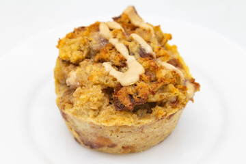 Single Serving of Bread Pudding on a White Plate