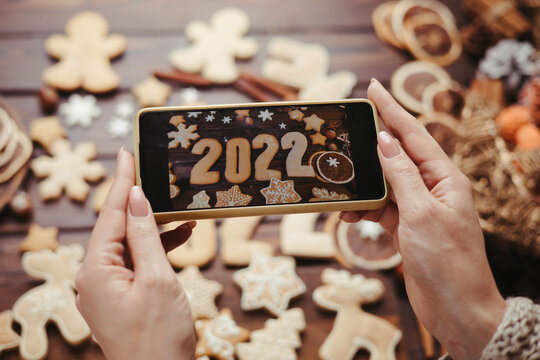 taking photography of gingerbread cookies on phone