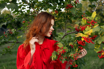 cheerful woman eating berries outdoors fresh air