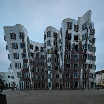 Dusseldorf, Germany  11-20-2021 The Neuer Zollhof in Dusseldorf are office buildings designed by Frank O. Gehry and opened in 1999 and represents the structural change of the Düsseldorf harbour.