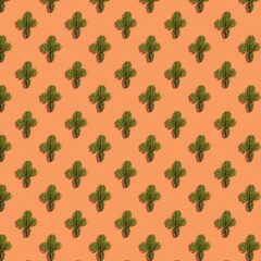 Natural christmas pattern from fir twigs on coral color background. Evergreen needles background