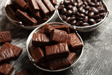 Festive Happy New Year's table full of chocolates. Assortment of delicious chocolate candies background