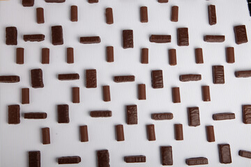 Festive Happy New Year's table full of chocolates. Assortment of delicious chocolate candies background