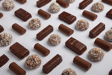 Festive Happy New Year's table full of chocolates. Assortment of delicious chocolate candies background
