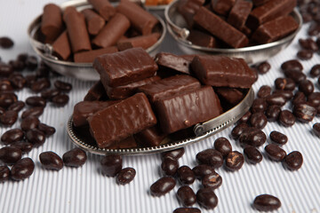 Festive Happy New Year's table full of chocolates. Assortment of delicious chocolate candies background
