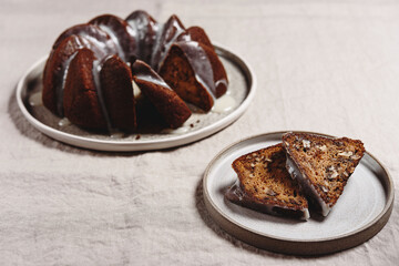 Pumpkin tangerine bundt cake with pumpkin spice and nuts for winter dinner. Selective focus
