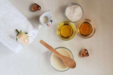 Facial skin whitening mask. Rice flour, honey, olive oil, milk. Flat lay on white background