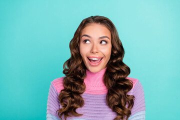 Photo of hooray brunette young lady look empty space wear striped sweater isolated on teal color background