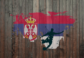 The flag of Serbia and a football player with a ball in action, grunge, on a wooden background, illustration