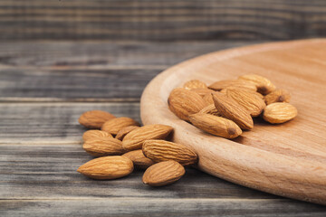 Almonds on a wooden table.
