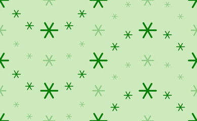 Seamless pattern of large and small green astrological sextile symbols. The elements are arranged in a wavy. Vector illustration on light green background