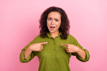 Photo of unhappy upset young afro american woman point finger herself shock offended isolated on...