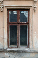 Old window in a wooden frame.